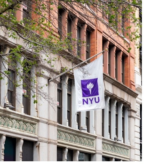 NYU flag on outside of building